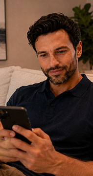 Automotive customer completing a post-visit rating on a mobile phone